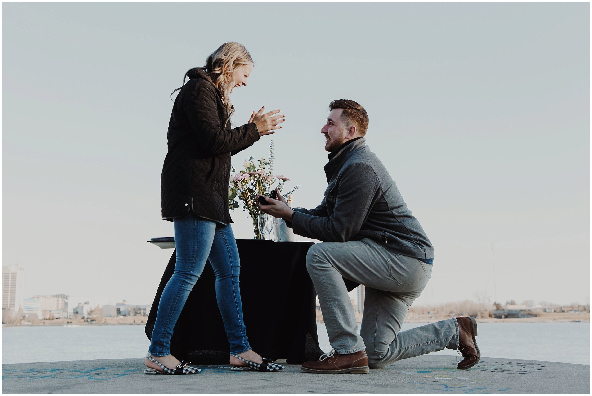 Detroit Riverwalk surprise marriage proposal in the winter.