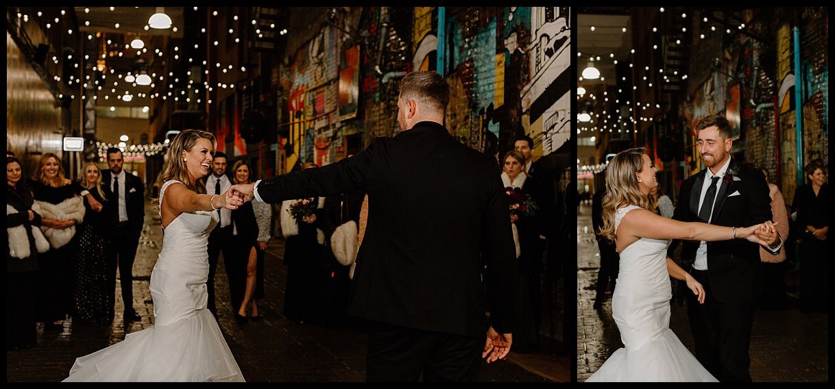 A pop-up wedding first dance held in downtown Detroit’s The Belt with the bride and groom and their wedding party. The bride wears a mermaid wedding dress by Maggie Soterro and the groom where a classic black tux from State and Liberty.