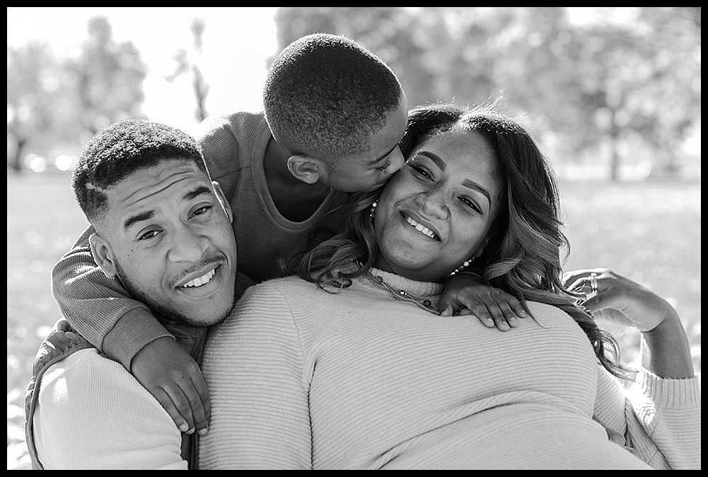  Black and white maternity photo with young son.  