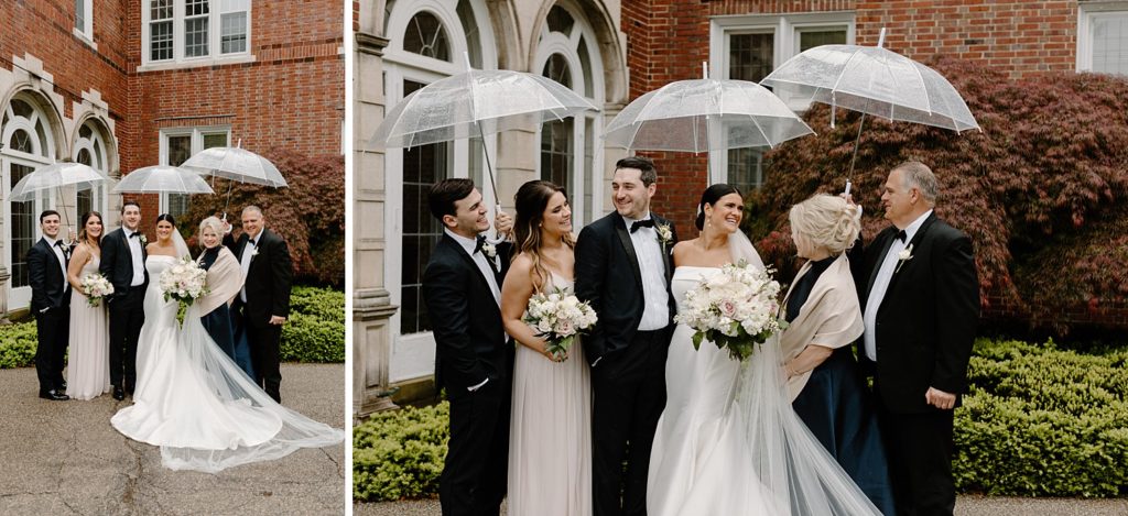 couple standing under clear umbrellas with their family 