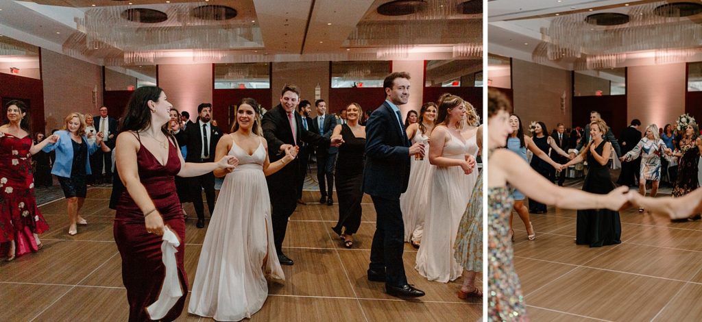 lines of guests holding hands and dancing 