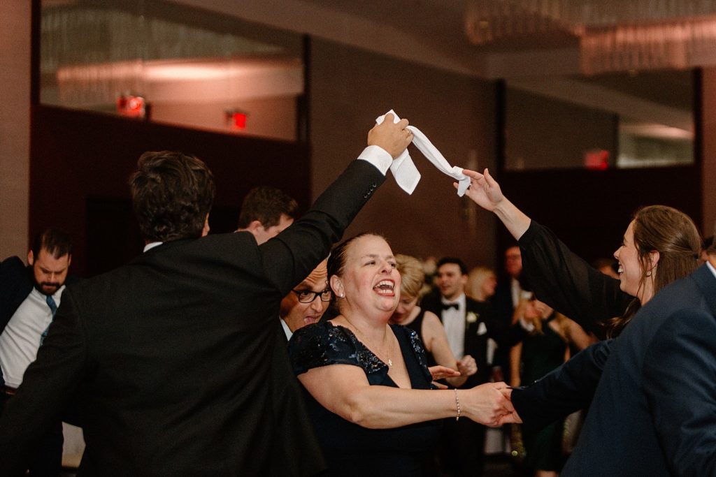guests dancing together at the reception 