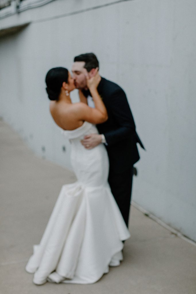 blurred picture of couple kissing 